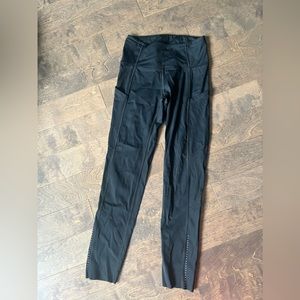 Lululemon speed tight with pockets and reflective dots size 4